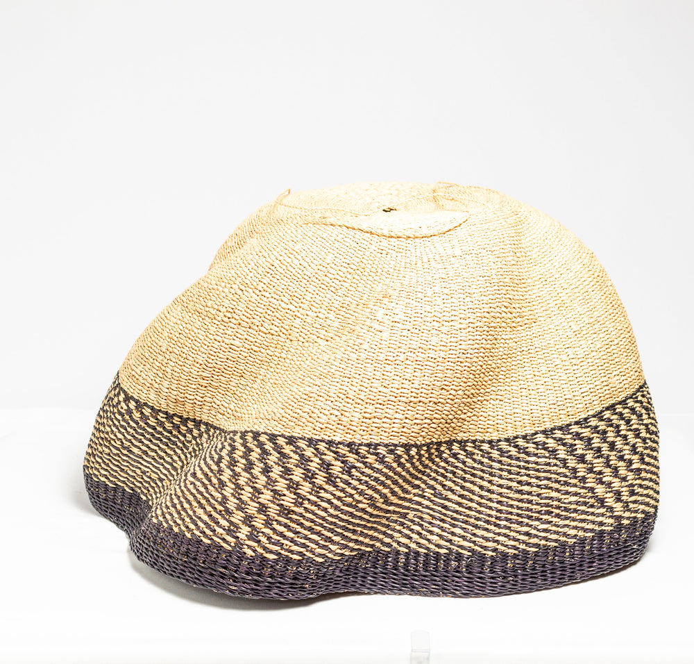 
                  
                    A close up of wavy basket that is used as light pendant 
                  
                