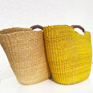 
                  
                    Unique structured Bolga basket tote with leather handles, handmade by Ghanaian weavers
                  
                