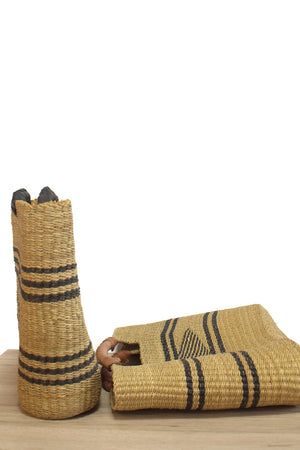 
                  
                    two natural and black bolga handbagds with leather handles
                  
                