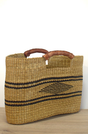 
                  
                    straw handbag with black details
                  
                