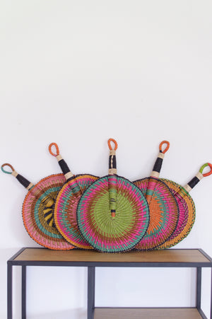 
                  
                    pastel colors round bolga fans in a row
                  
                